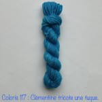 Coloris 117 : Clémentine tricote une tuque.